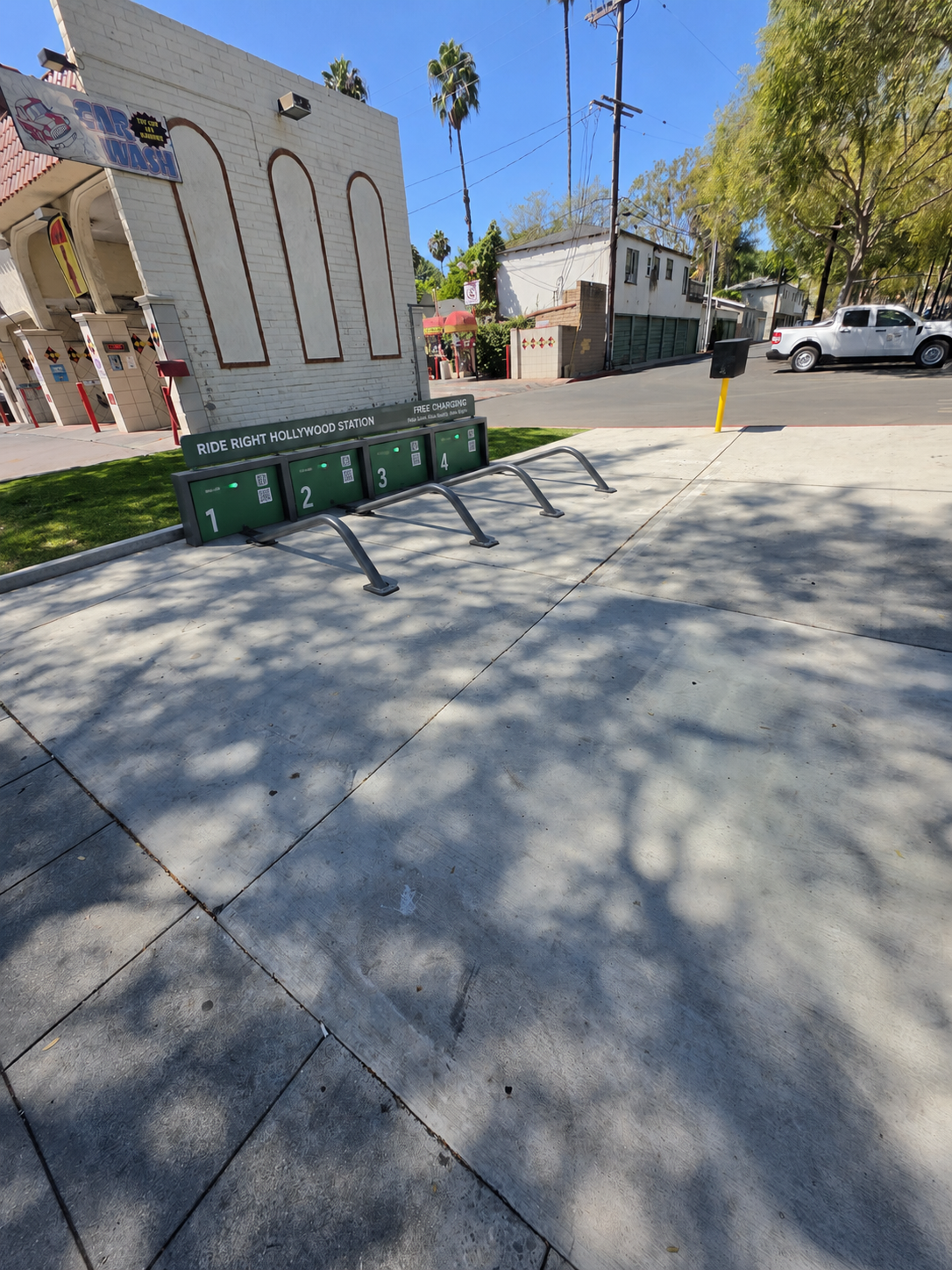 Concept for a Ride Right parking and charging station with four lockable bays